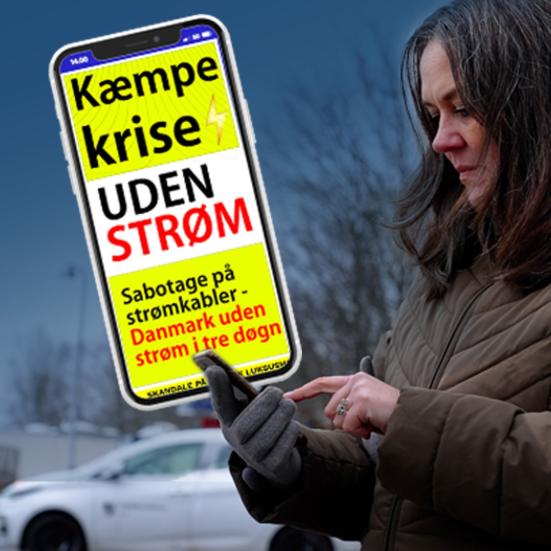 Foto af dame med mobiltelefon fra Beredskabsforbundet